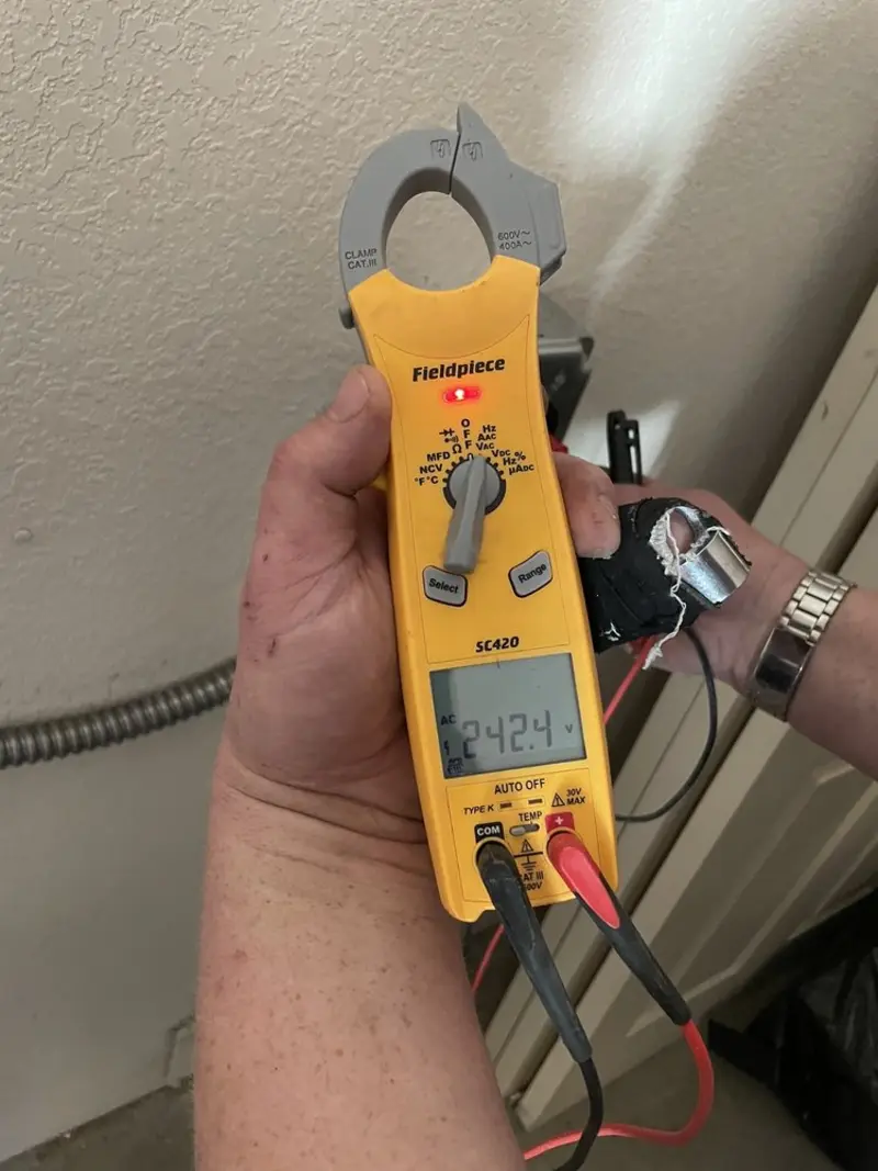 Voltage testing with clamp meter during Generator Installation in Westville